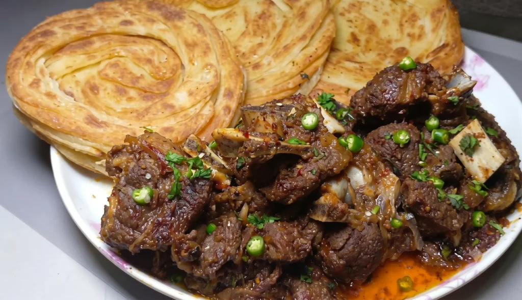 Malabar Parotta with Lamb Chukka