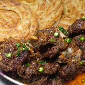 Malabar Parotta with Lamb Chukka